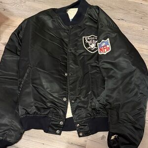 STARTER Black Satin Raiders Bomber Jacket with NFL Patch